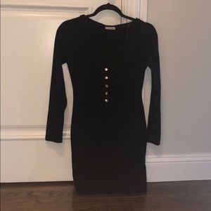 Tight black long sleeve dress with buttons